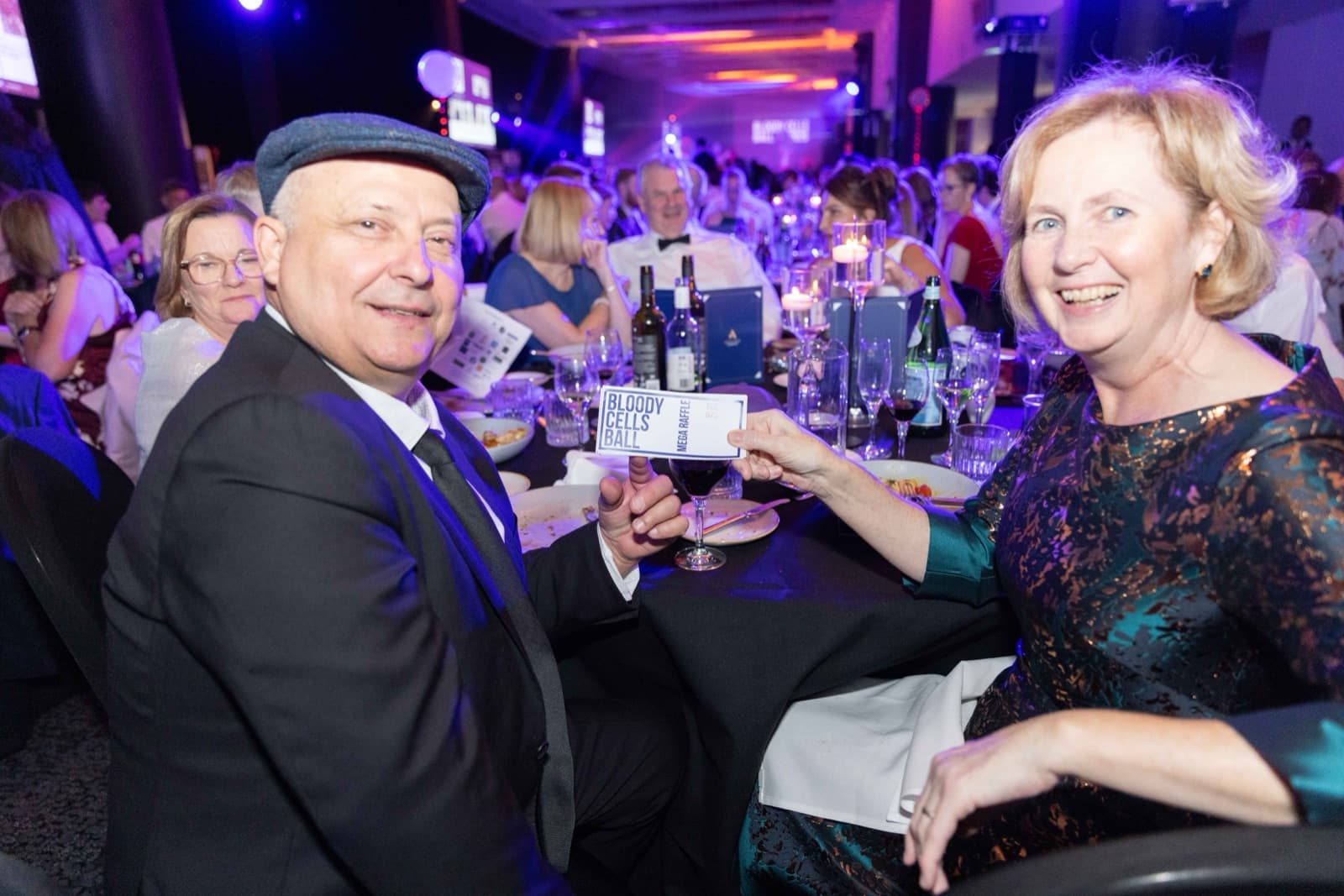 Auction and raffle activity at the 2025 Bloody Cells Ball, photographed by Noni Carroll Photography