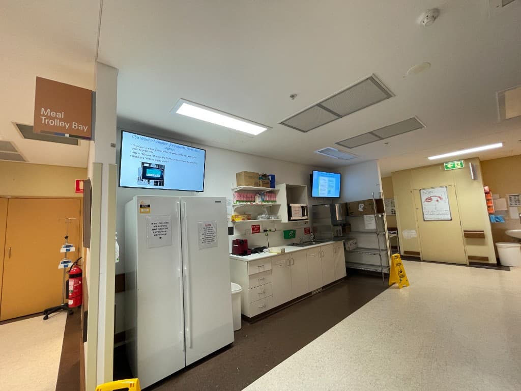 The Meal Trolley Bay on Westmead's Ward C5A, with the new educational display screens visible above the kitchen and meal area